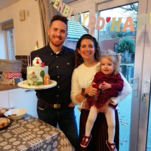 Mari celebrates her second birthday with parents Bethan and Carwyn.