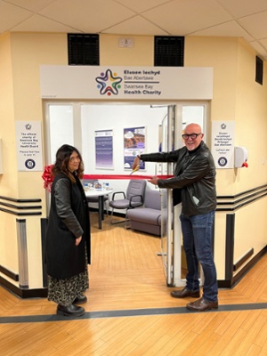 Musician and entertainer Mal Pope, who is championing the charity's Cwtsh Clos campaign, officially opened the new hub along with Nuria Zolle, Chair of the Charitable Funds Committee.